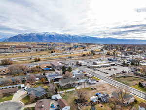Aerial view of residential area with a mountainous background