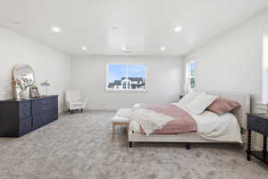 Bedroom featuring carpet and recessed lighting