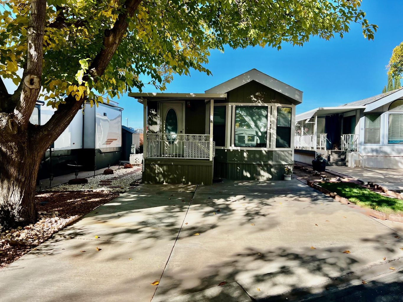 View of front of property with a sunroom