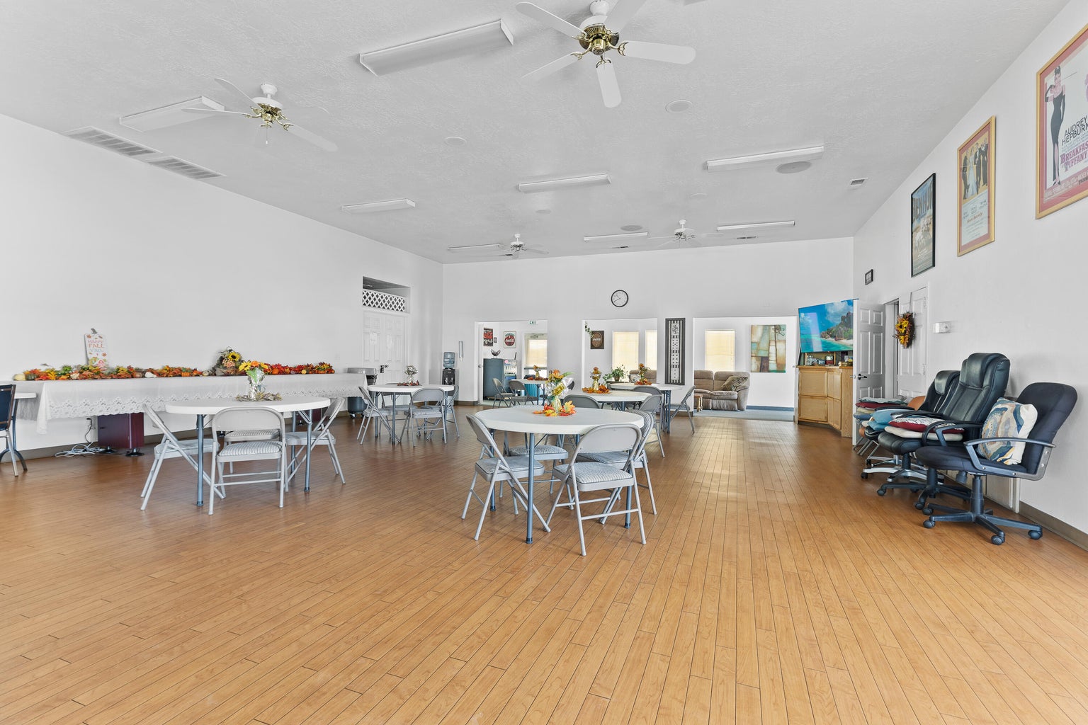 Dining area with light wood-type flooring and ceiling fan