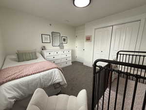 2nd Bedroom with  carpet and a closet