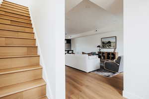 Staircase with wood finished floors