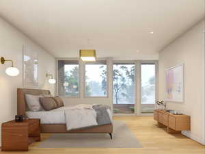 Bedroom featuring multiple windows, light wood-style flooring, and recessed lighting