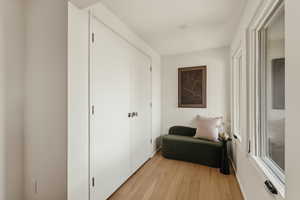 Sitting room featuring light wood finished floors
