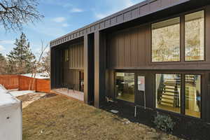 Back of property with board and batten siding