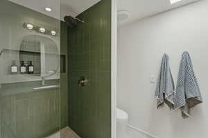 Bathroom with tiled shower