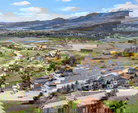 Aerial view of residential area with a water and mountain view