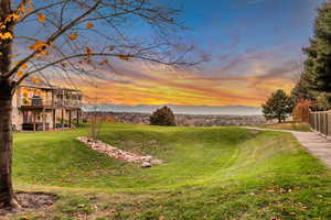 Common Space - View of green lawn featuring a mountain view