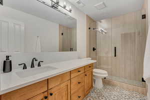 Second Level 3/4 bath featuring vanity, a stall shower, and light tile patterned floors
