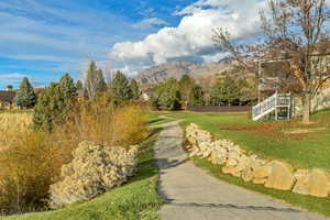 Common Space - View of community featuring a mountain view and stairway
