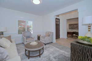 Living area featuring wood finished floors and baseboards