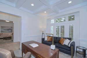 Office with beamed ceiling, coffered ceiling, and recessed lighting