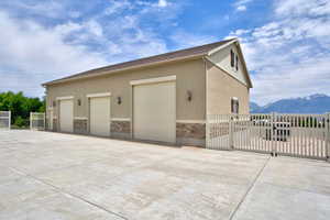 Garage with a gate and a mountain view