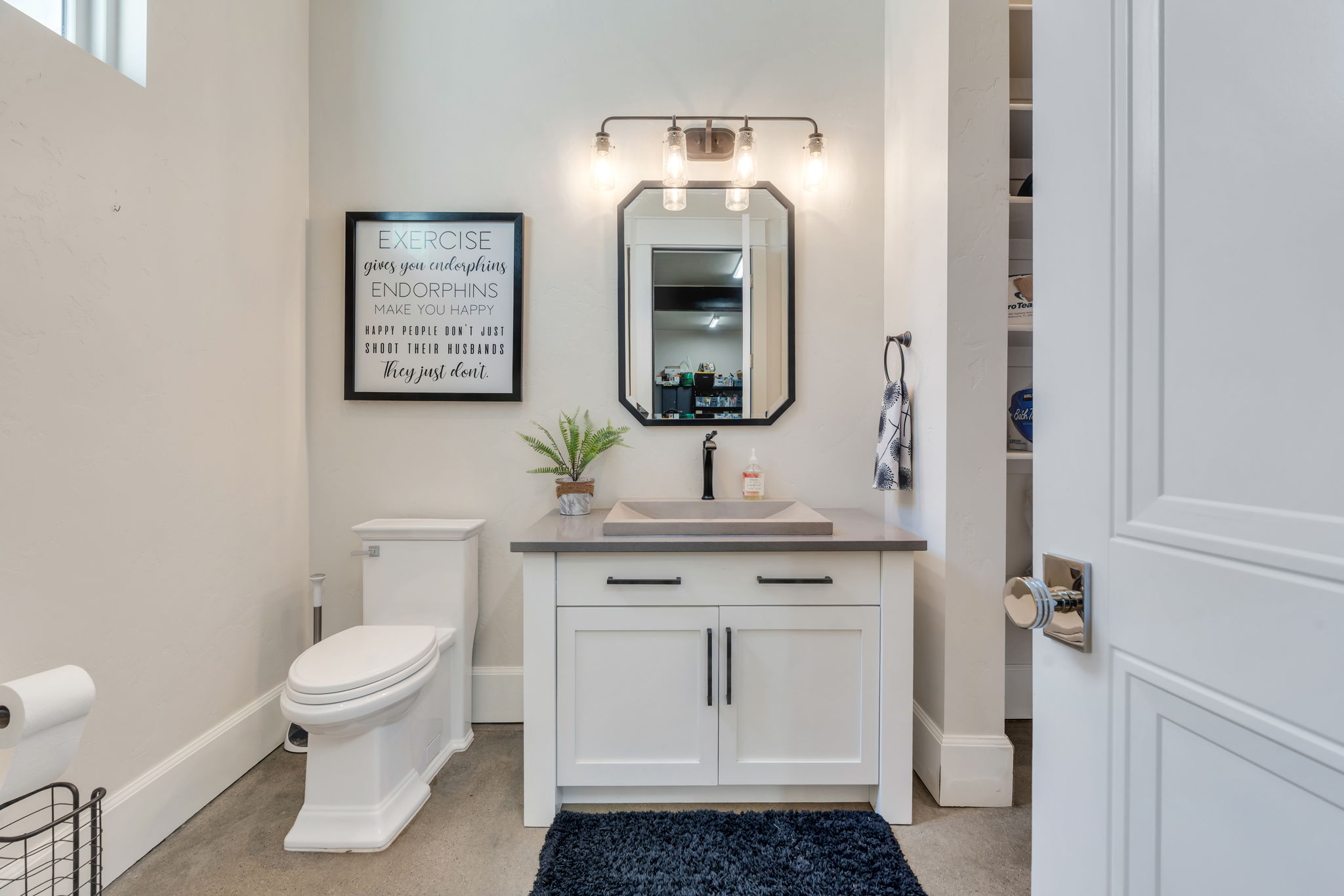 Bathroom with vanity and toilet