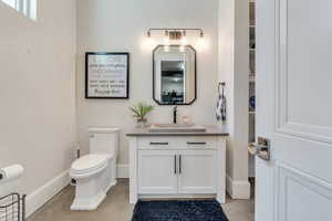 Bathroom with vanity and toilet
