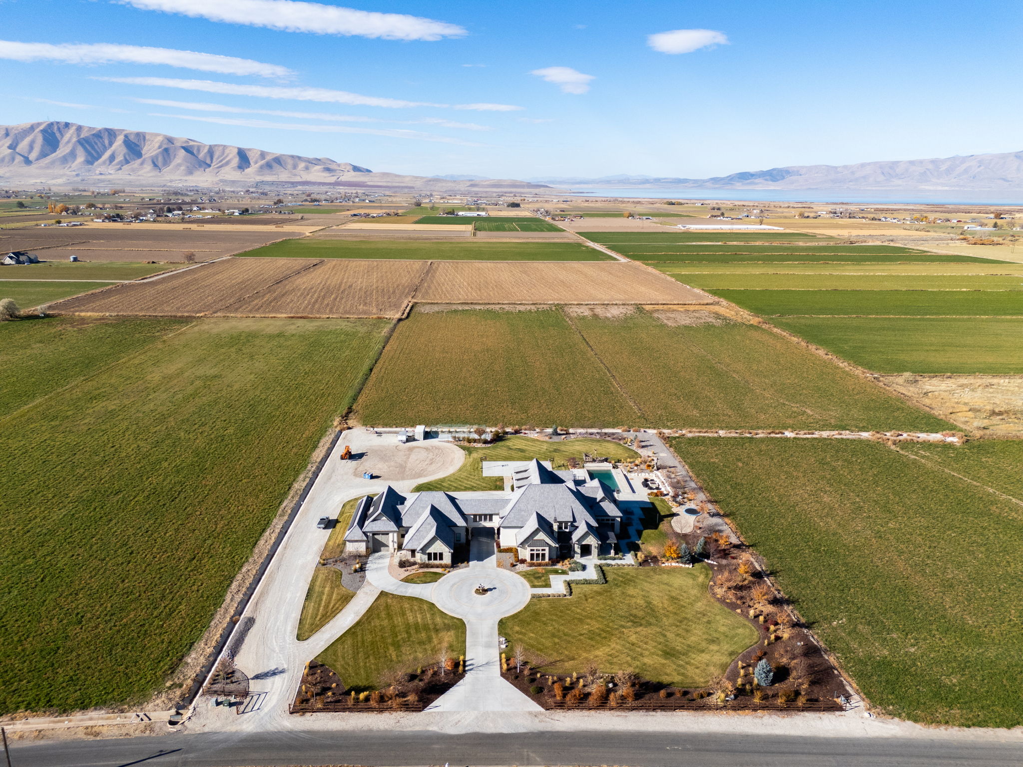 View of rural area featuring mountains and extensive farmland