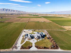 View of rural area featuring mountains and extensive farmland