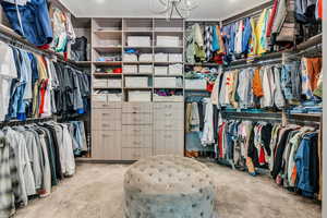 Spacious closet with a chandelier