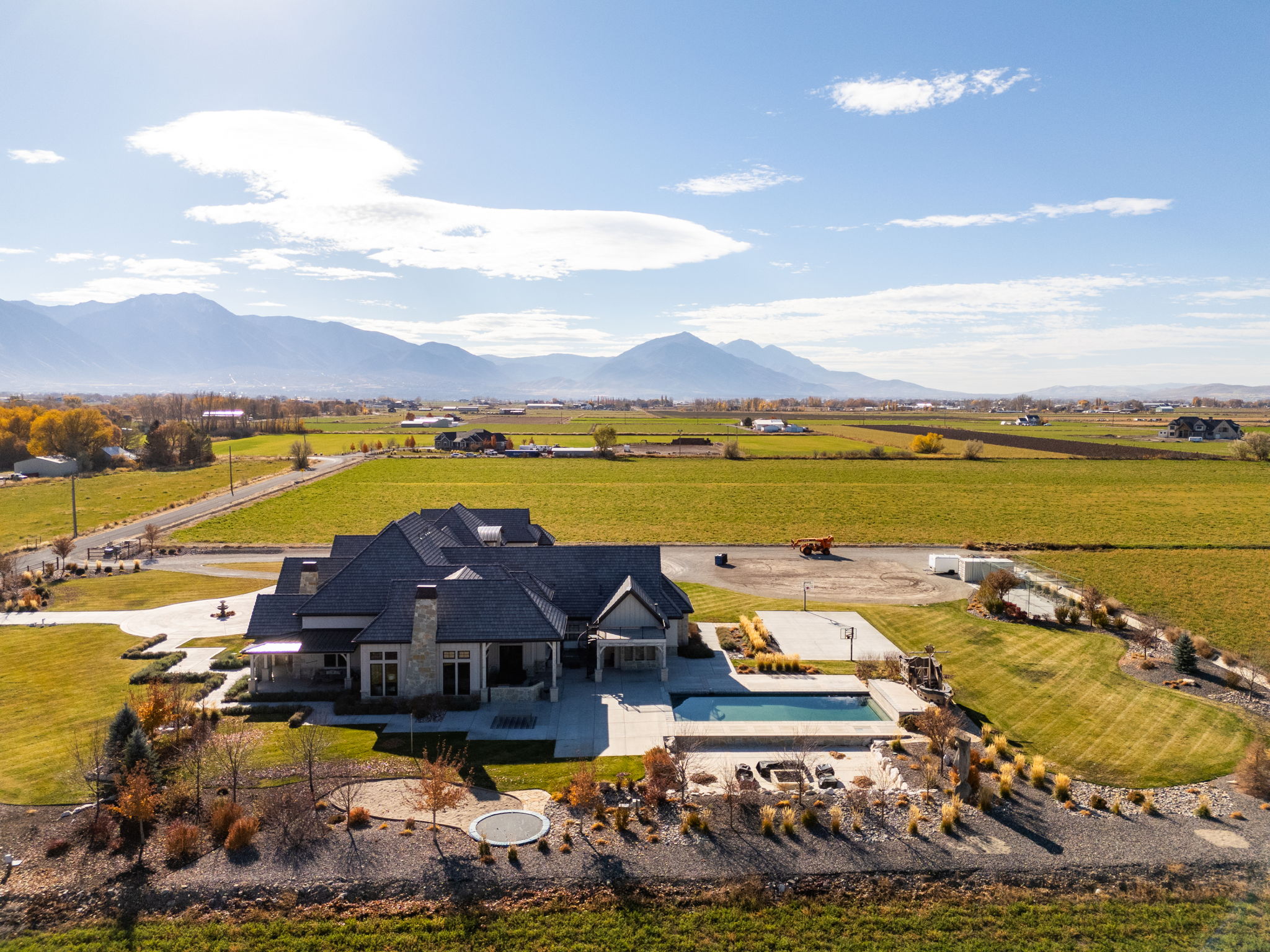 Overview of rural landscape featuring a mountain backdrop