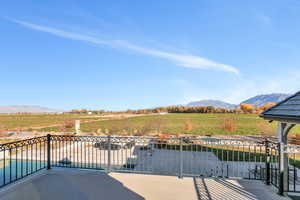 View of patio featuring a mountain view and a view of countryside
