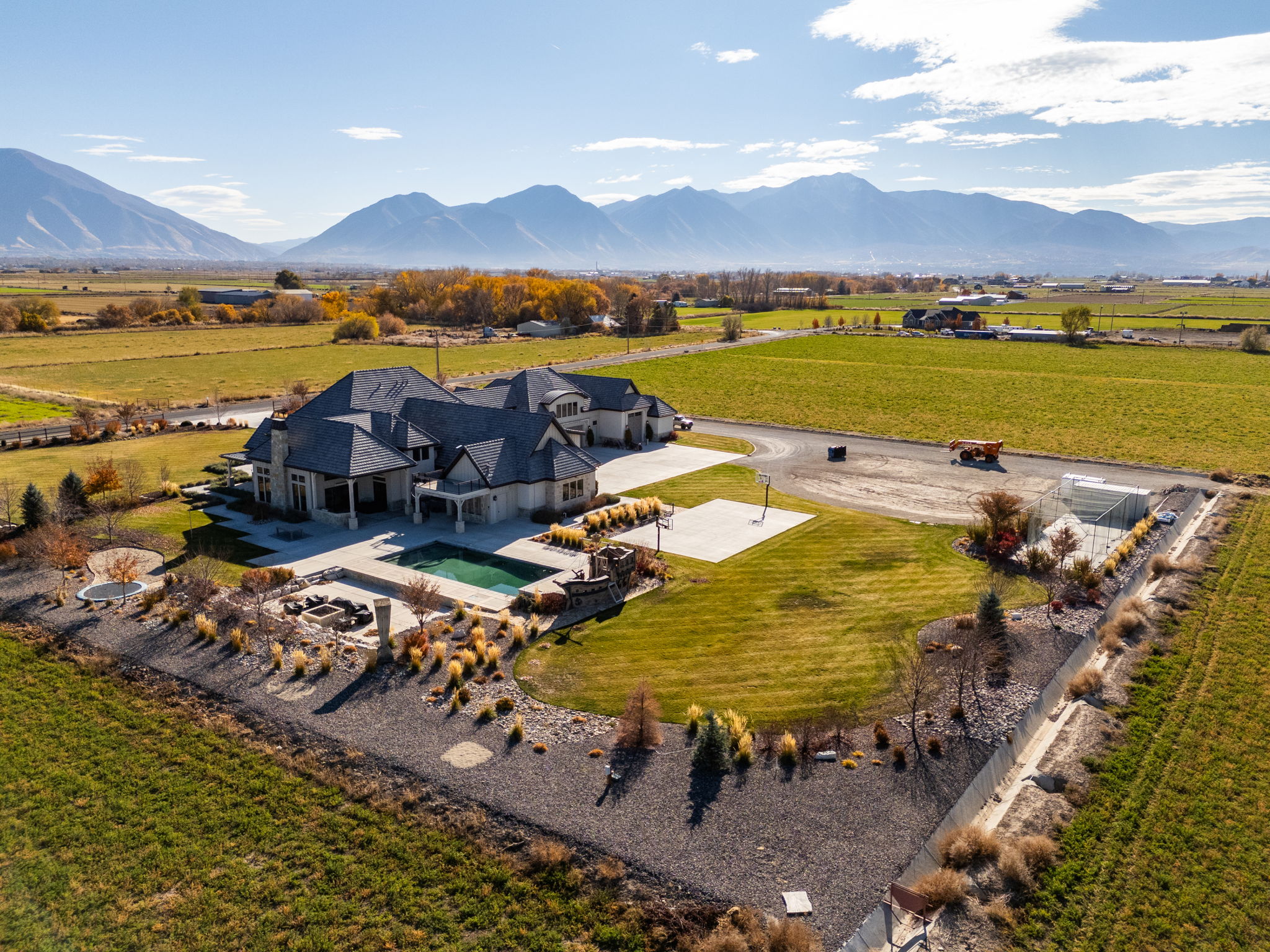Aerial view of sparsely populated area featuring a mountain backdrop