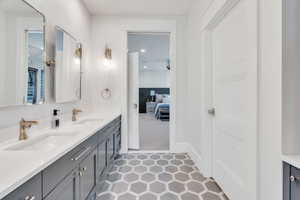 Bathroom with double vanity and ensuite bath