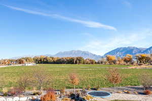 View of mountain backdrop with rural landscape