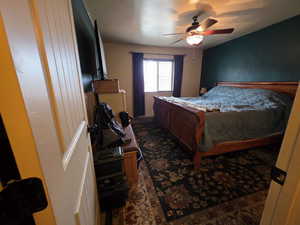 Bedroom featuring ceiling fan
