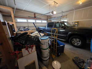 Garage featuring a garage door opener