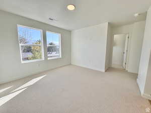 Primary suite features a large walk-in closet and en suite