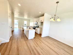 Good sized dining right off the kitchen with a large window for light