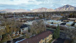 View of mountain background featuring nearby suburban area
