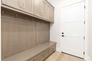 Mudroom featuring light wood-style flooring