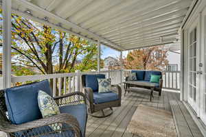 Wooden terrace with an outdoor living space