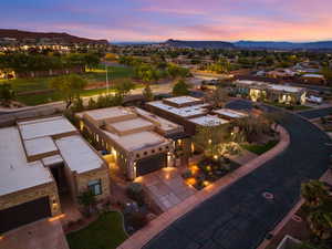 Aerial view at dusk of a residential view and a mountain view
