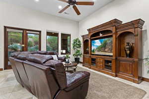 Living area featuring recessed lighting, ceiling fan, and light tile patterned floors