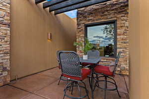 View of patio / terrace with outdoor dining area and a pergola