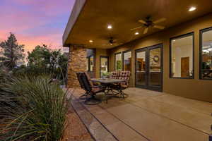 View of patio featuring a ceiling fan and french doors