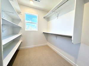 Walk in closet with great natural light from the large window