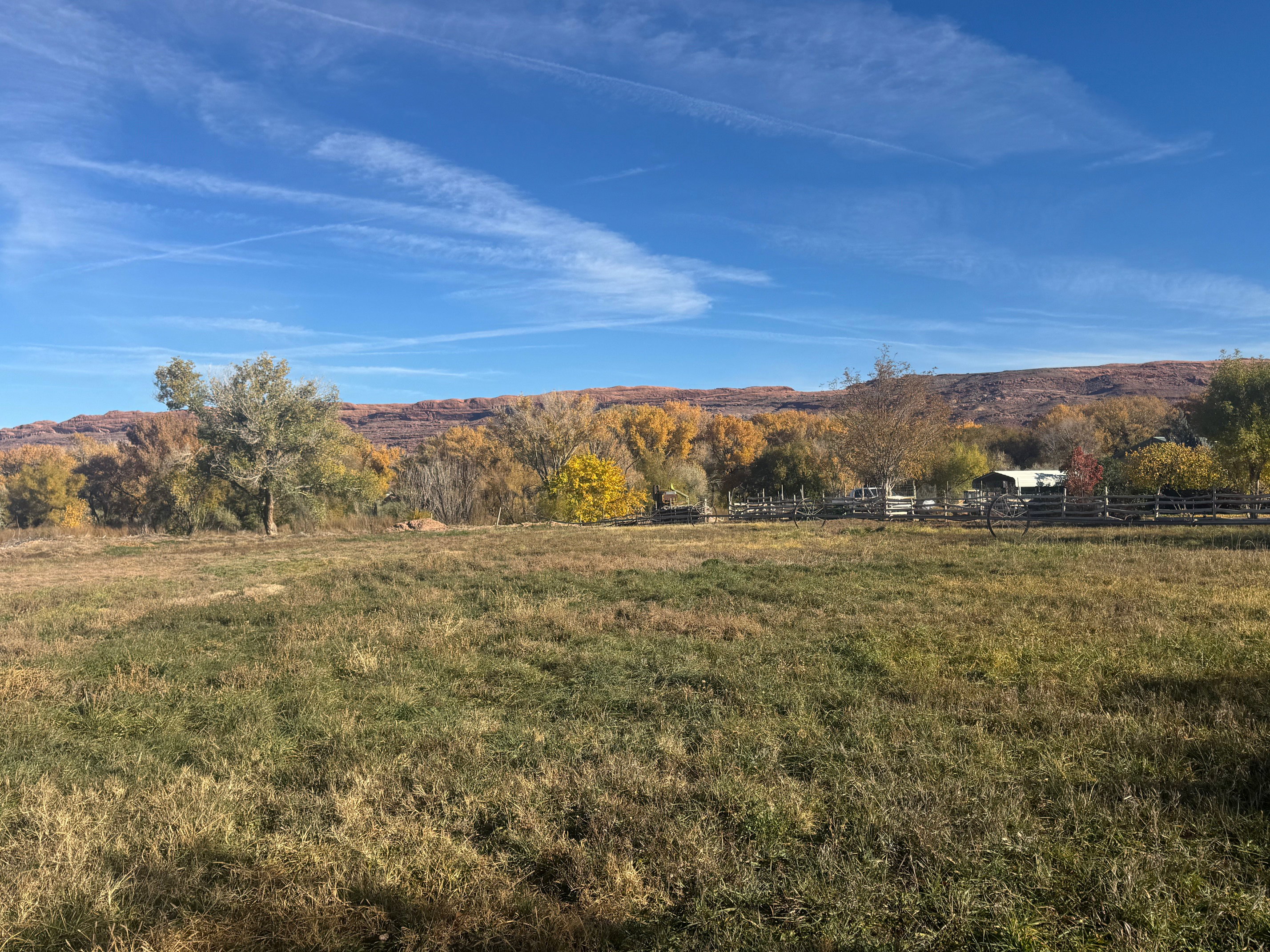 View of mountain background featuring rural landscape