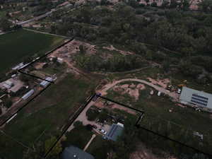 Aerial overview of property's location with property parcel outlined