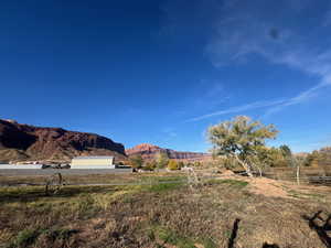 View of mountain background featuring rural landscape