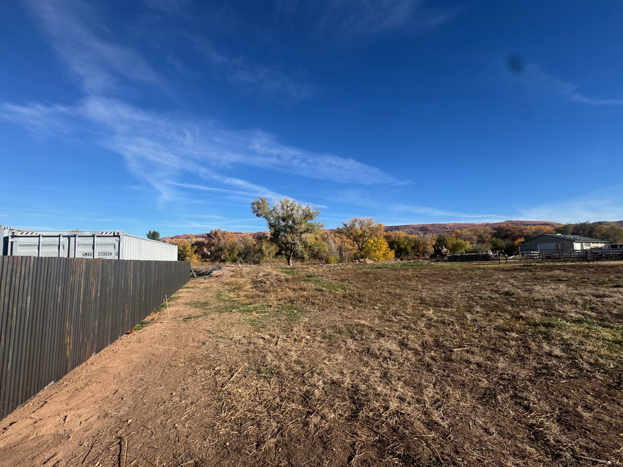 View of yard with a rural view