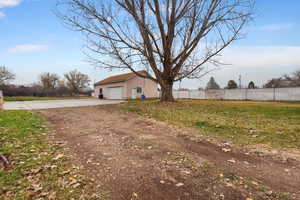 View of yard featuring huge garage