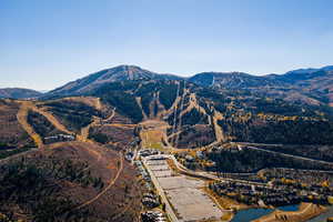 View of mountain backdrop with a large body of water