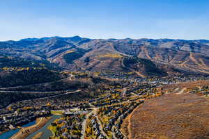 Mountain view featuring a large body of water