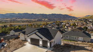 View of mountain backdrop with nearby suburban area