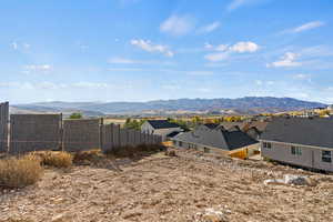 Mountain view featuring nearby suburban area