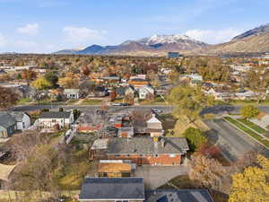 View of property location featuring a mountain backdrop and nearby suburban area