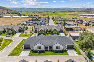 Aerial perspective of suburban area featuring mountains